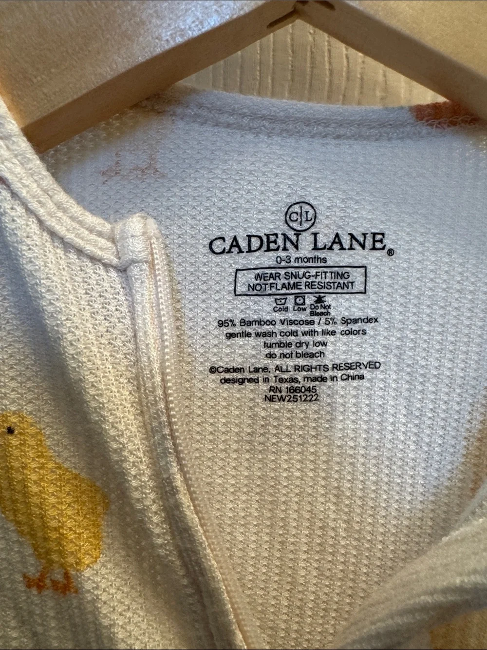 Caden Lane Cream Footed One-Piece with Yellow Chick & Orange Carrot Print
